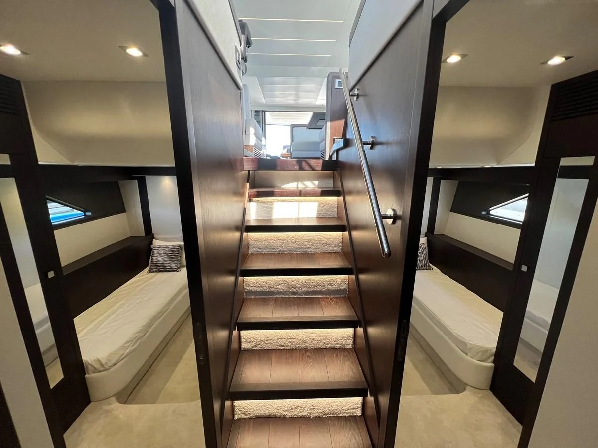 a wooden staircase in a building aboard 66 MANHATTAN Yacht for Sale