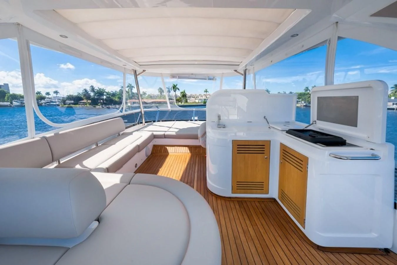 a boat with a desk and a computer aboard 66 MANHATTAN Yacht for Sale