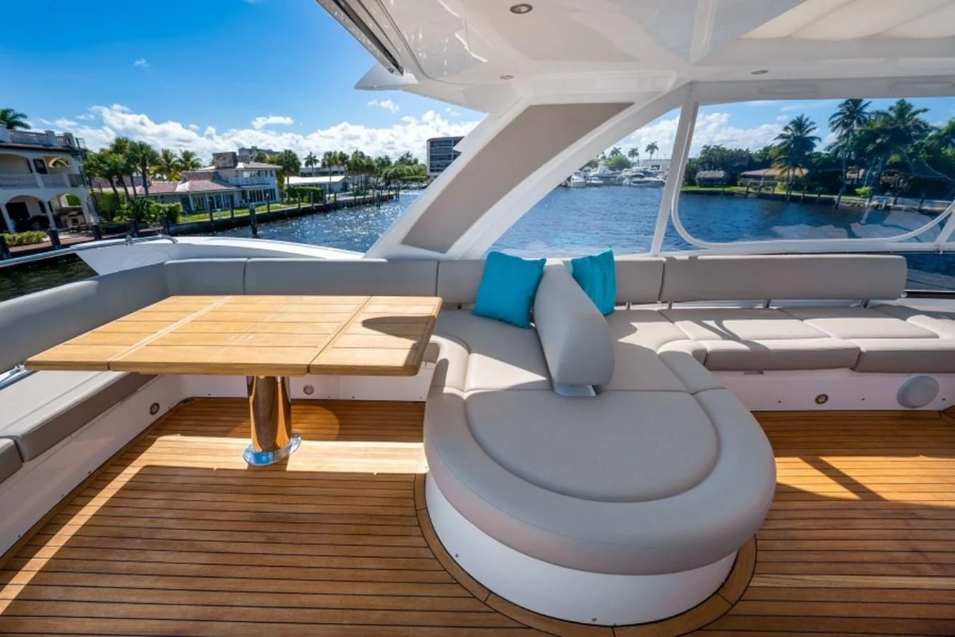a room with a large white lounge chair and a pool aboard 66 MANHATTAN Yacht for Sale