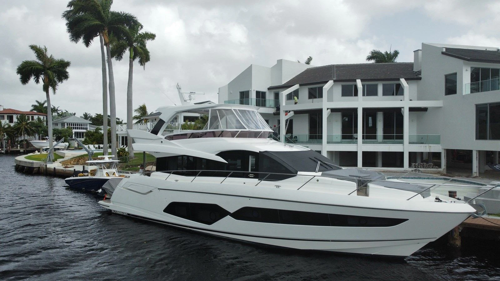 a boat parked on the side of a body of water aboard 66 MANHATTAN Yacht for Sale