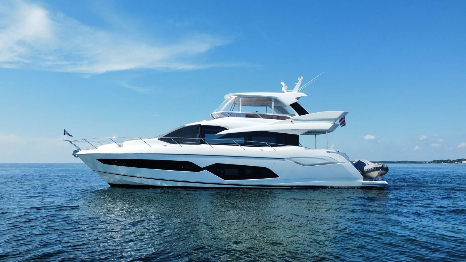 a white yacht on the water aboard 66 MANHATTAN Yacht for Sale