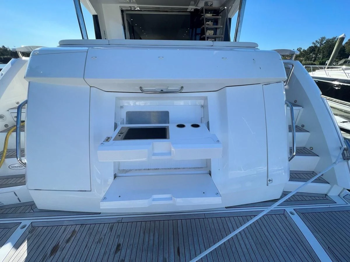 a white machine on a trailer aboard 66 MANHATTAN Yacht for Sale