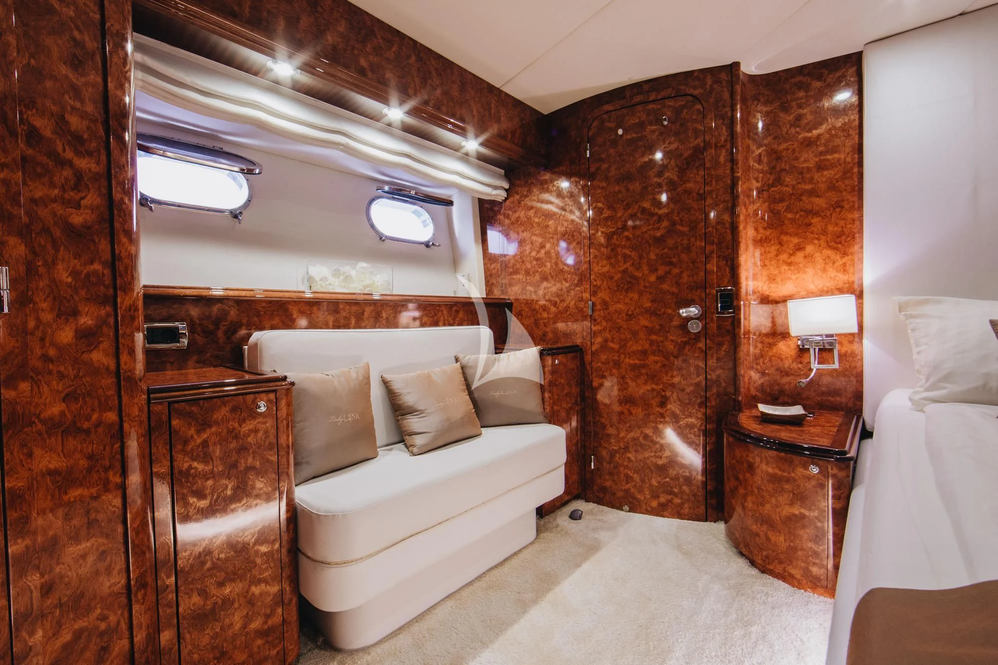 a room with a bed and a dresser aboard LADY LONA Yacht for Sale