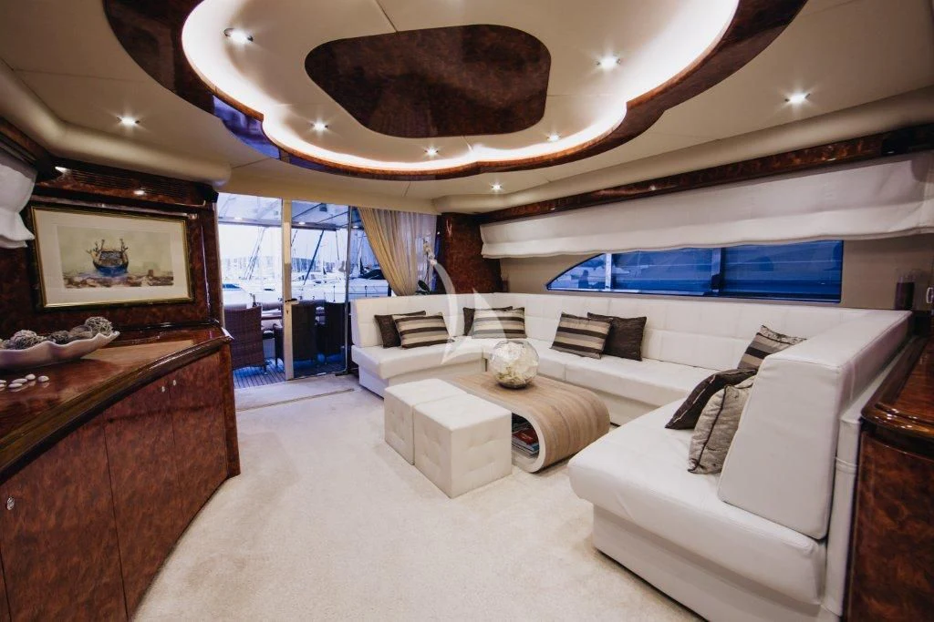 a room with a bed and a couch aboard LADY LONA Yacht for Sale
