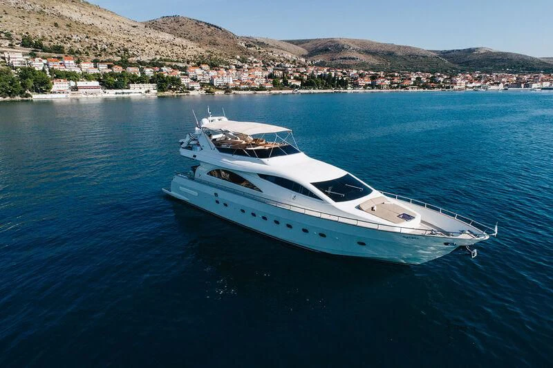 a white yacht in the water aboard LADY LONA Yacht for Sale