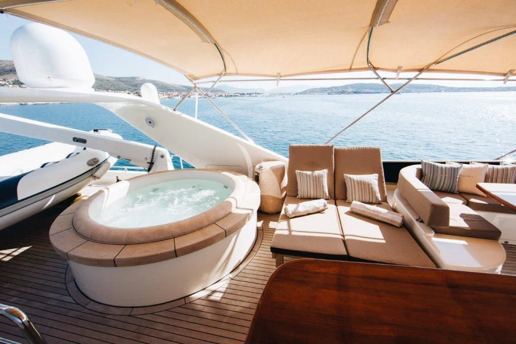 a boat with many chairs on it aboard LADY LONA Yacht for Sale