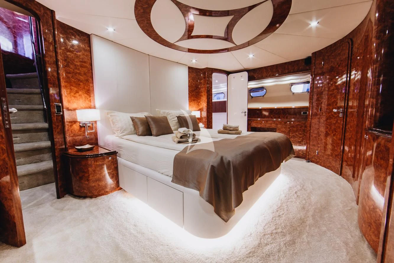a bed in a room aboard LADY LONA Yacht for Sale