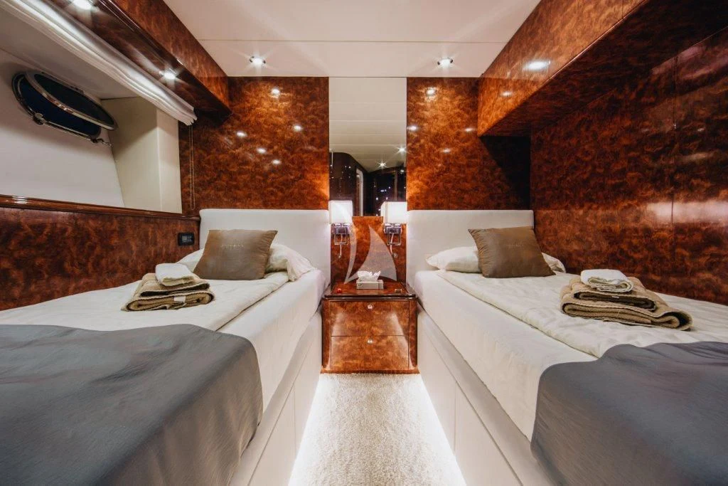 a room with two beds aboard LADY LONA Yacht for Sale
