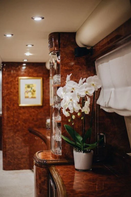 a vase with white flowers aboard LADY LONA Yacht for Sale