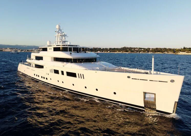 a large white boat on a beach aboard NAUTILUS Yacht for Sale