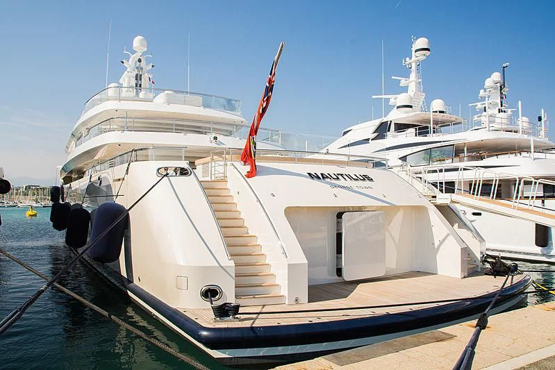 a boat docked at a dock aboard NAUTILUS Yacht for Sale
