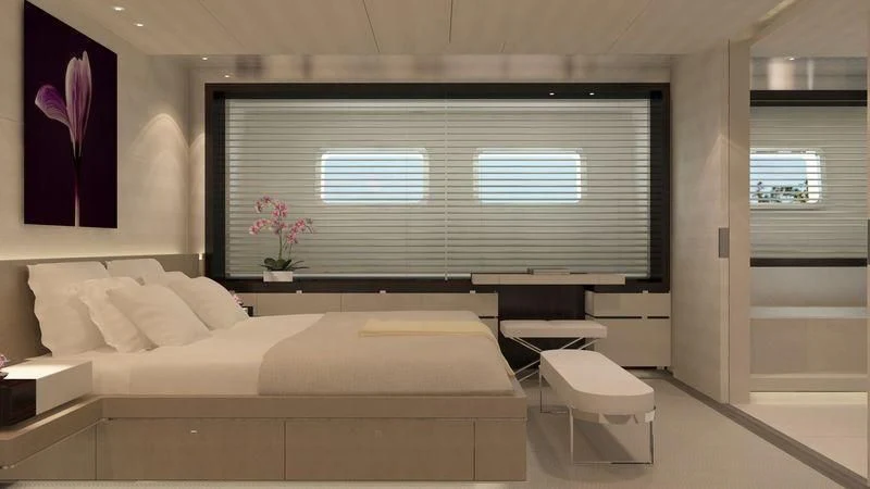 a room with a bed and a window aboard NAUTILUS Yacht for Sale