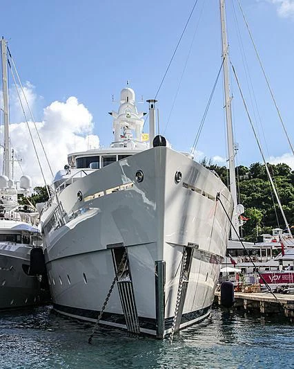 a boat docked at a pier aboard NAUTILUS Yacht for Sale