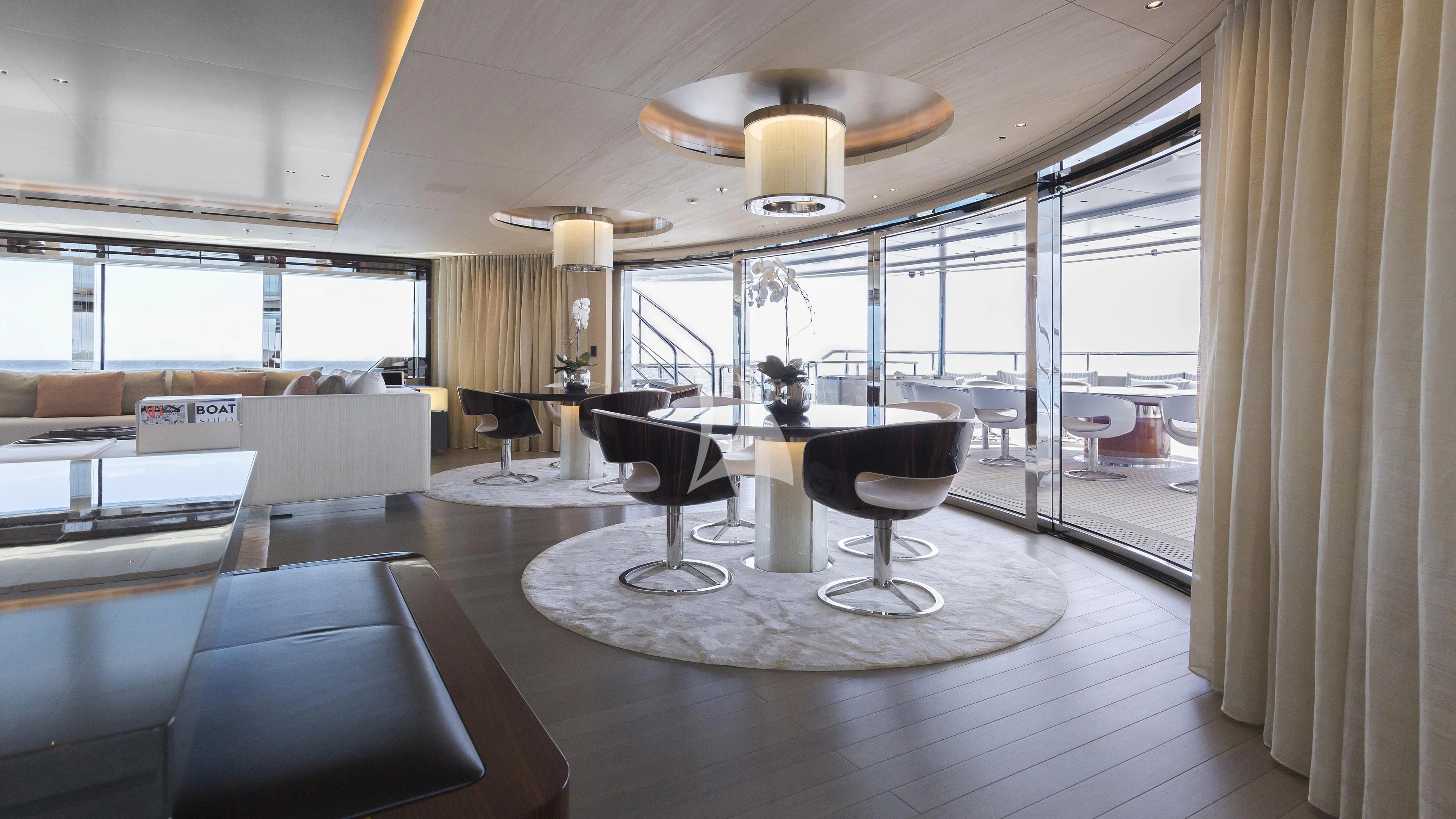 a room with a table and chairs aboard NAUTILUS Yacht for Sale