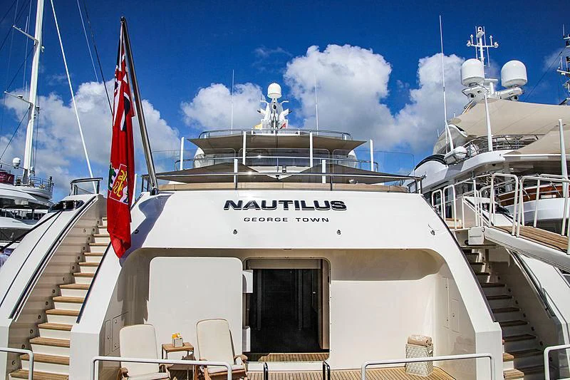 a boat with a flag on the front aboard NAUTILUS Yacht for Sale