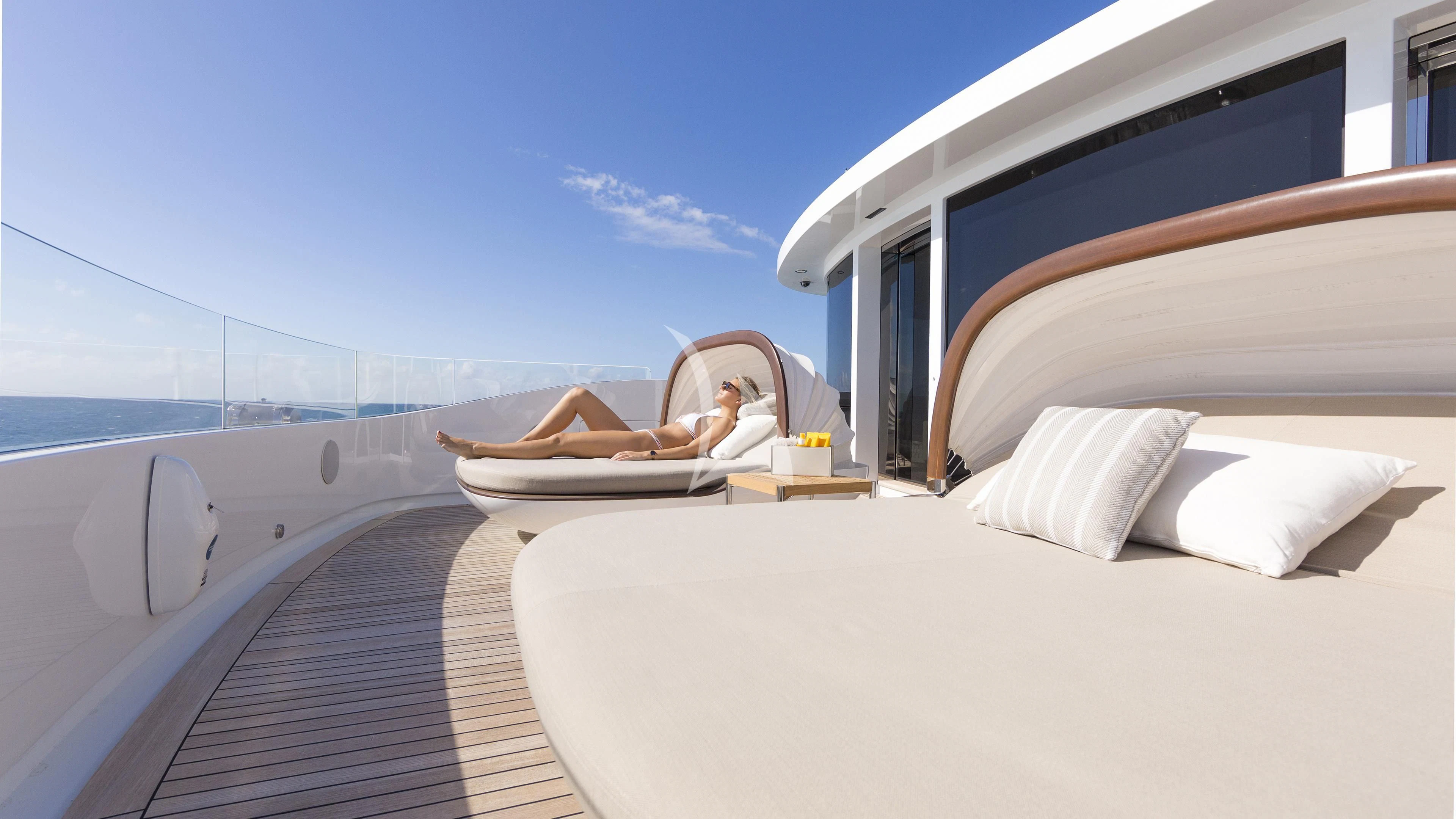 a person lying on a bed aboard NAUTILUS Yacht for Sale