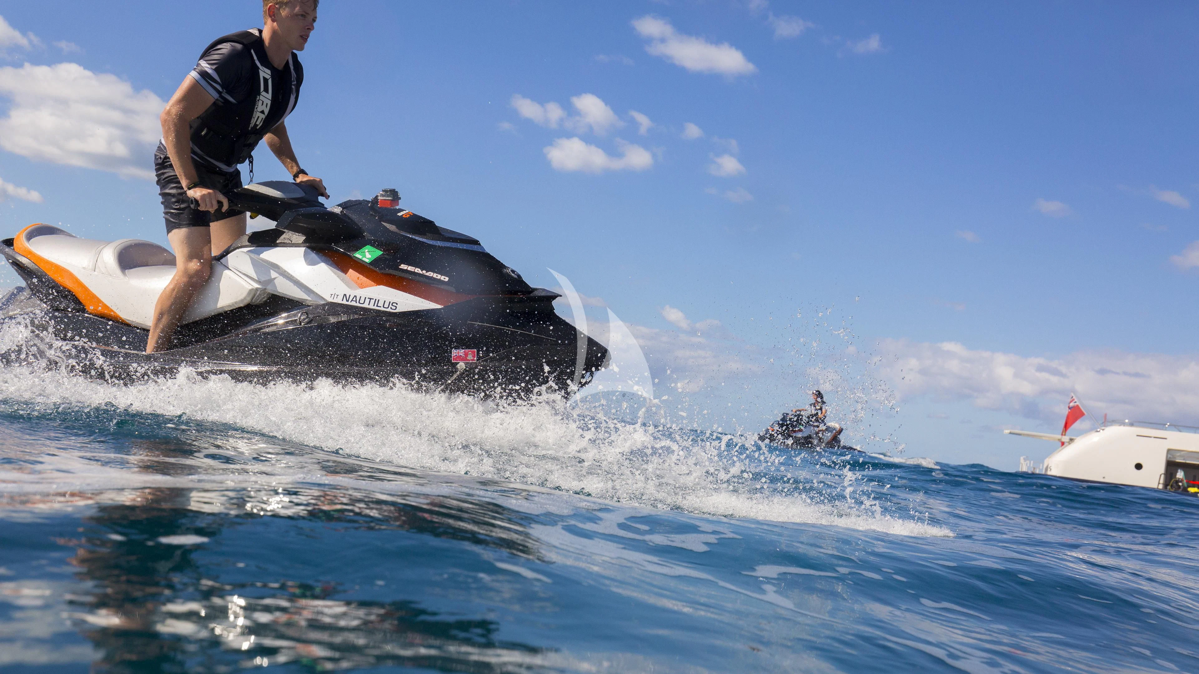 a man on a jet ski aboard NAUTILUS Yacht for Sale