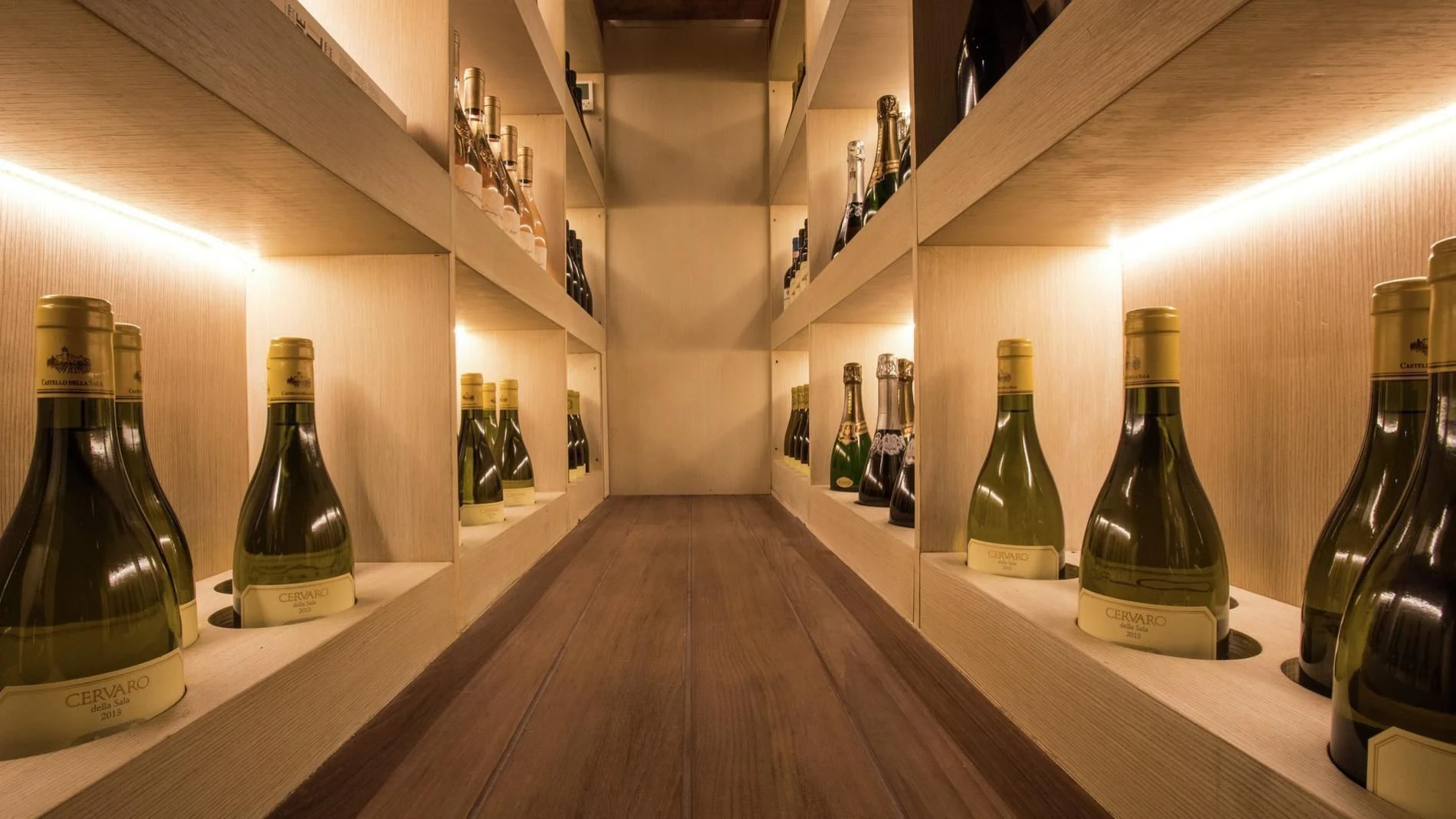 a row of bottles on a shelf aboard NAUTILUS Yacht for Sale