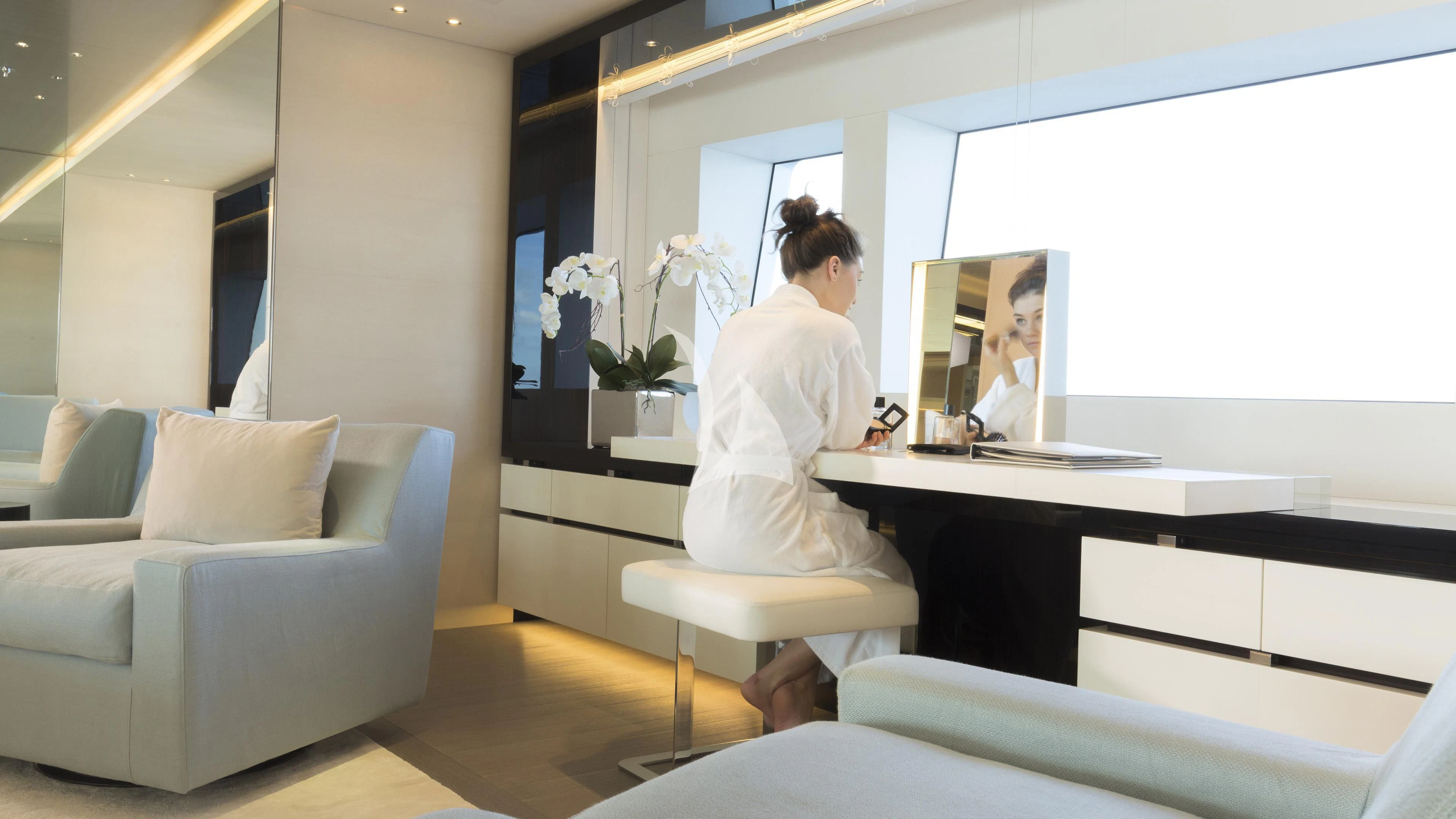 a person sitting in a chair aboard NAUTILUS Yacht for Sale