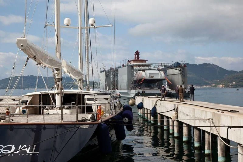 a boat docked at a pier aboard NAUTILUS Yacht for Sale