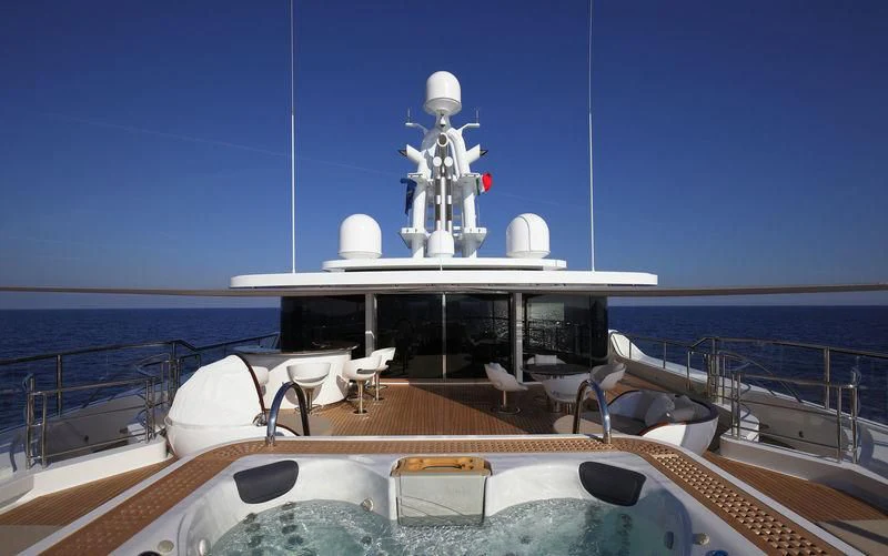 a large white boat with a statue on the front aboard NAUTILUS Yacht for Sale