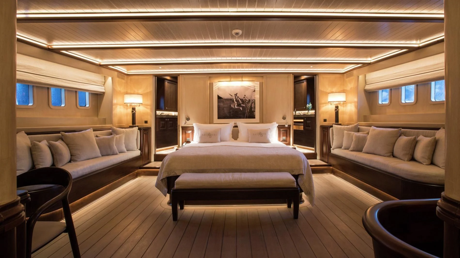 a hotel room with a bed and a couch aboard NAUTILUS Yacht for Sale