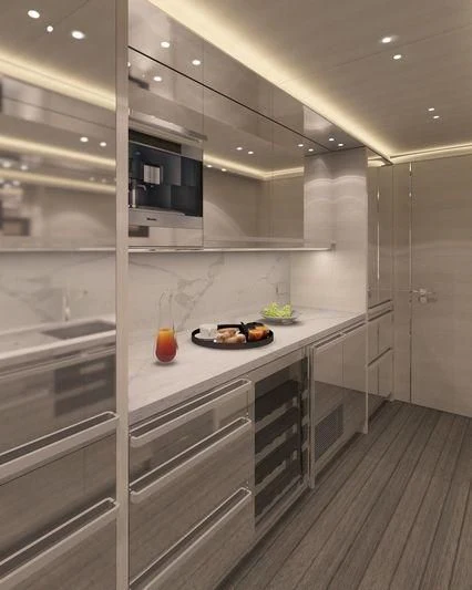 a kitchen with white cabinets aboard NAUTILUS Yacht for Sale