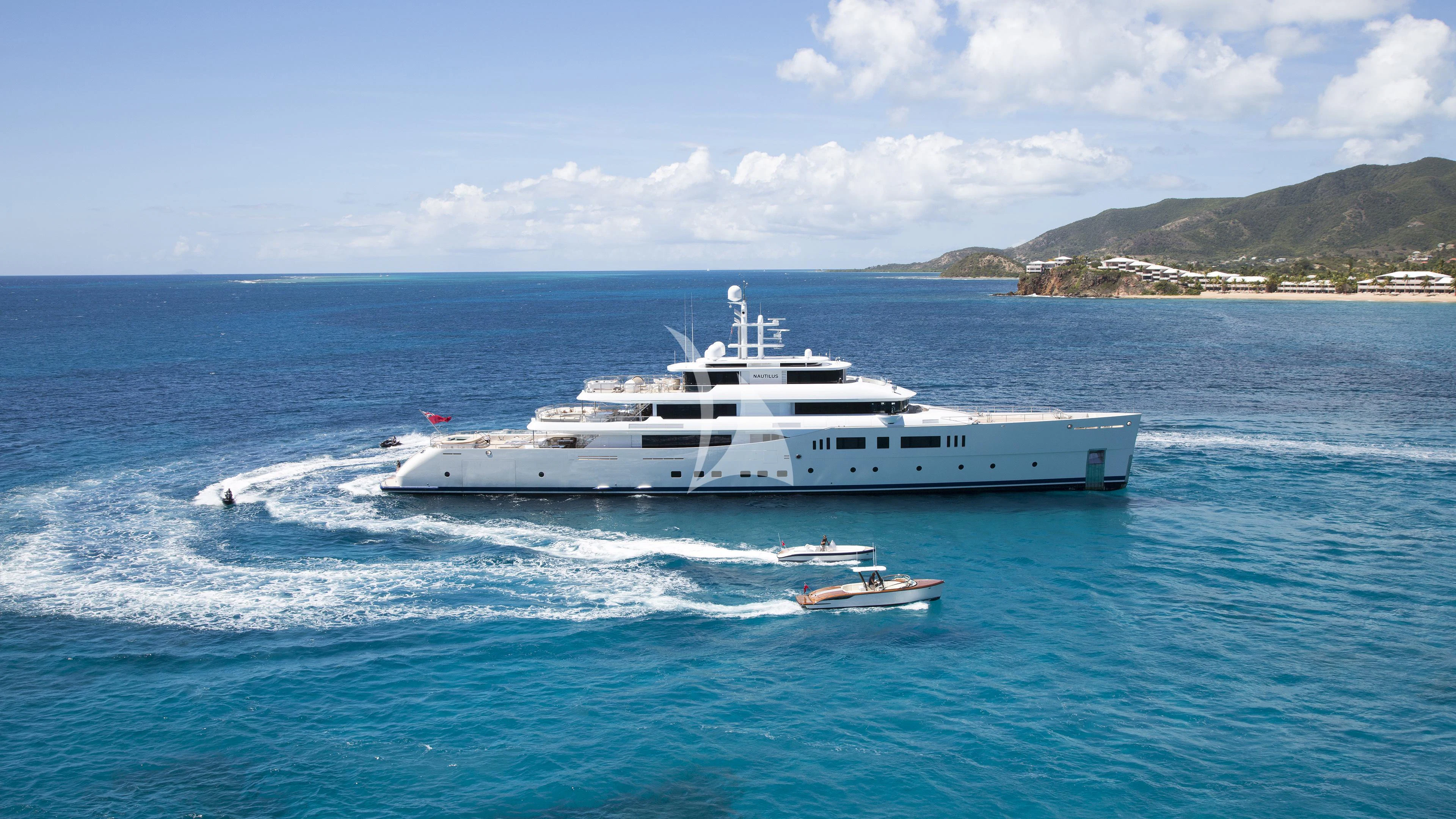 a white yacht in the water aboard NAUTILUS Yacht for Sale