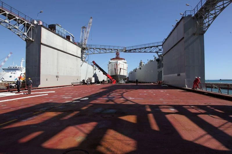a large ship on a dock aboard NAUTILUS Yacht for Sale