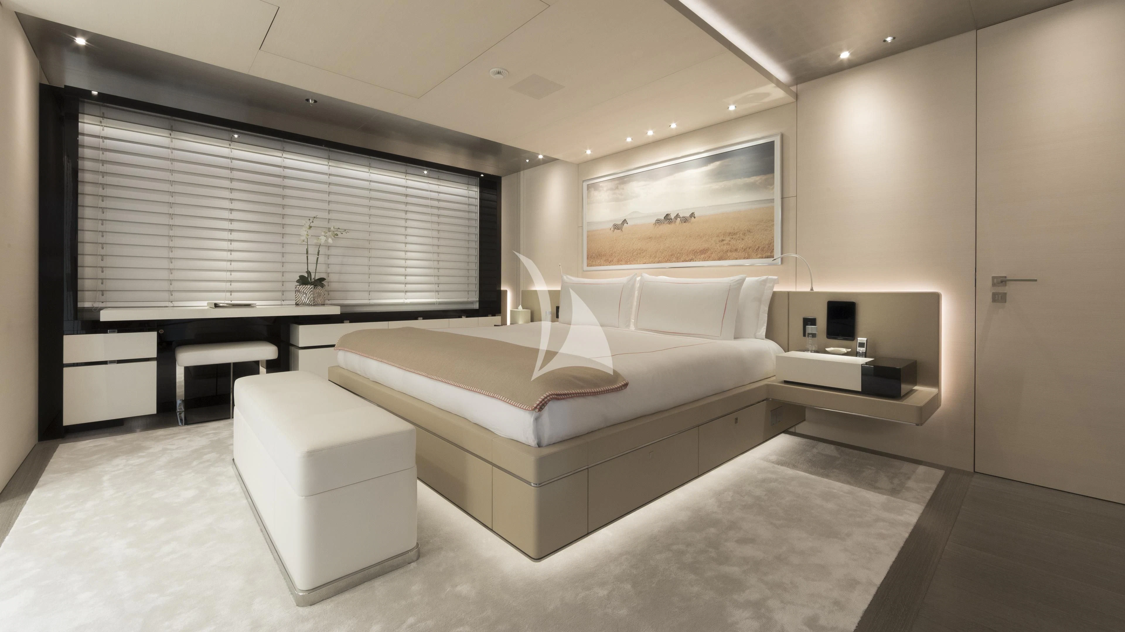 a room with a bed and a desk aboard NAUTILUS Yacht for Sale