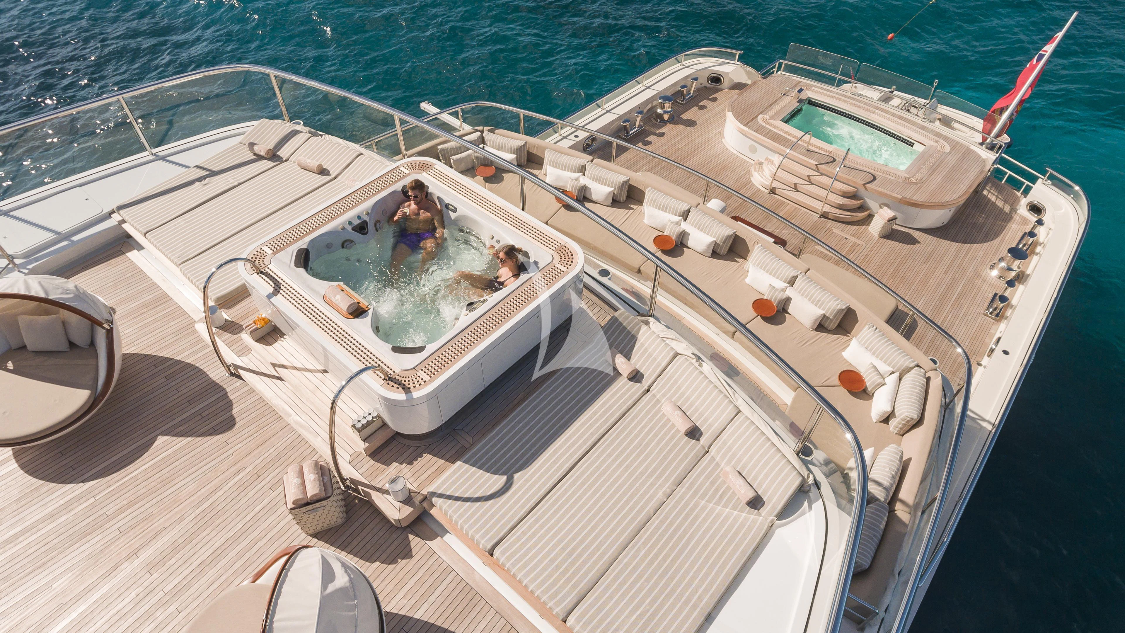 a man and a woman on a boat aboard NAUTILUS Yacht for Sale