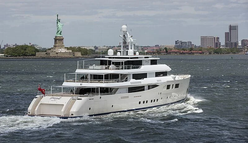 a large white boat with a statue on it aboard NAUTILUS Yacht for Sale