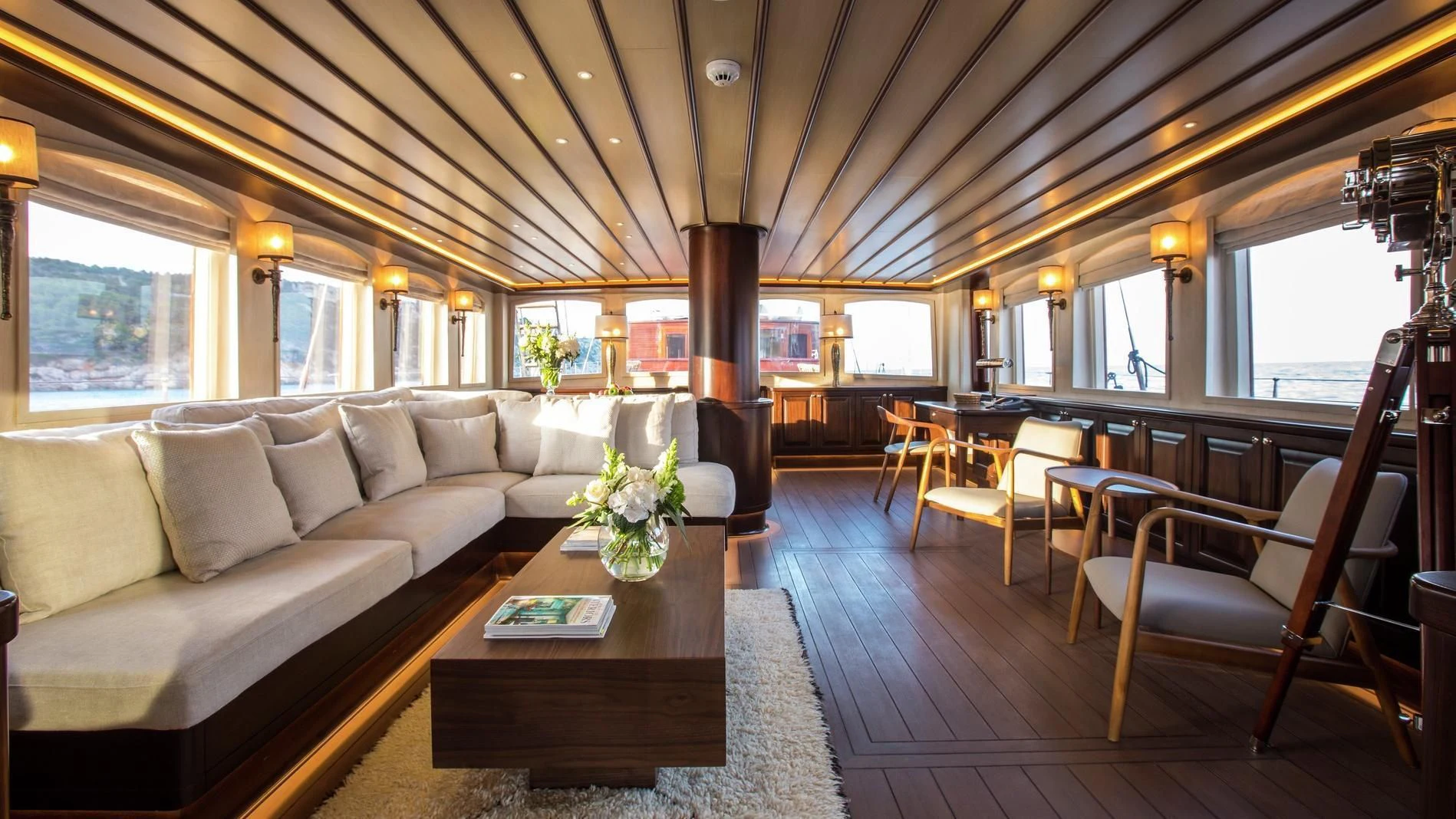 a living room with a couch and a coffee table aboard NAUTILUS Yacht for Sale