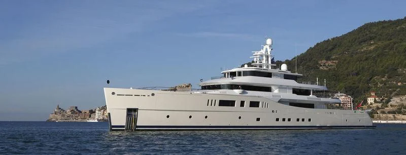 a large white boat in the water aboard NAUTILUS Yacht for Sale