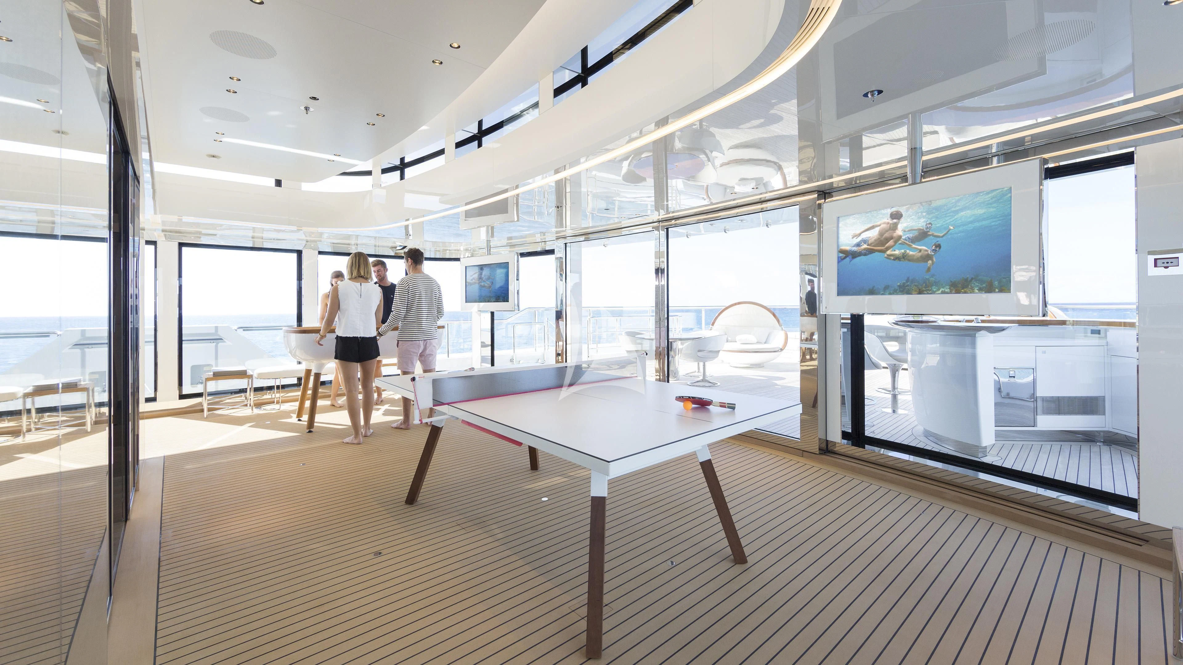 a room with a table and chairs aboard NAUTILUS Yacht for Sale