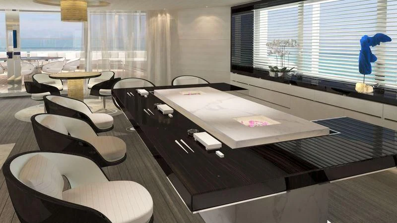 a room with tables and chairs aboard NAUTILUS Yacht for Sale