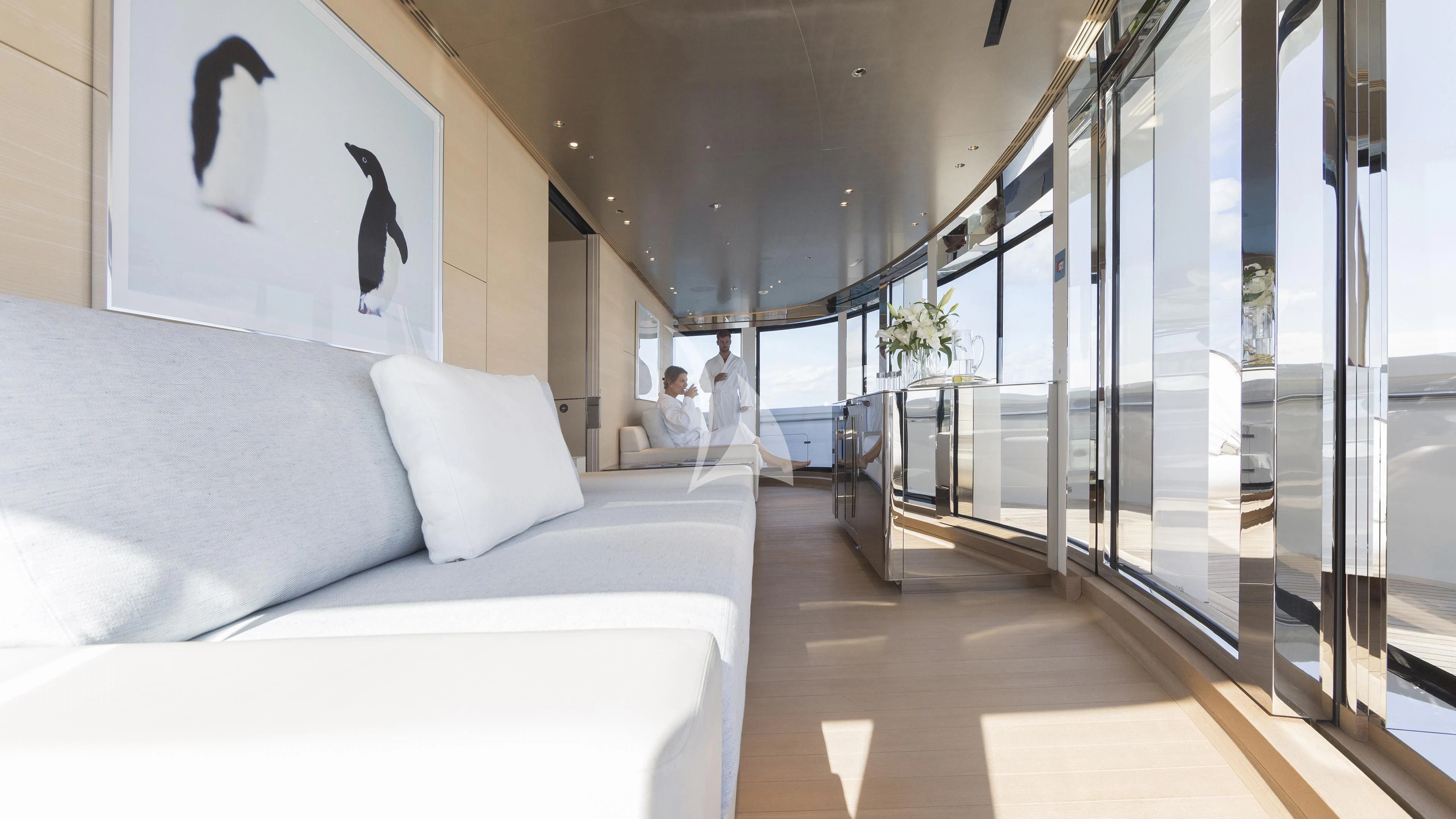 a room with a bed and a couple of people aboard NAUTILUS Yacht for Sale