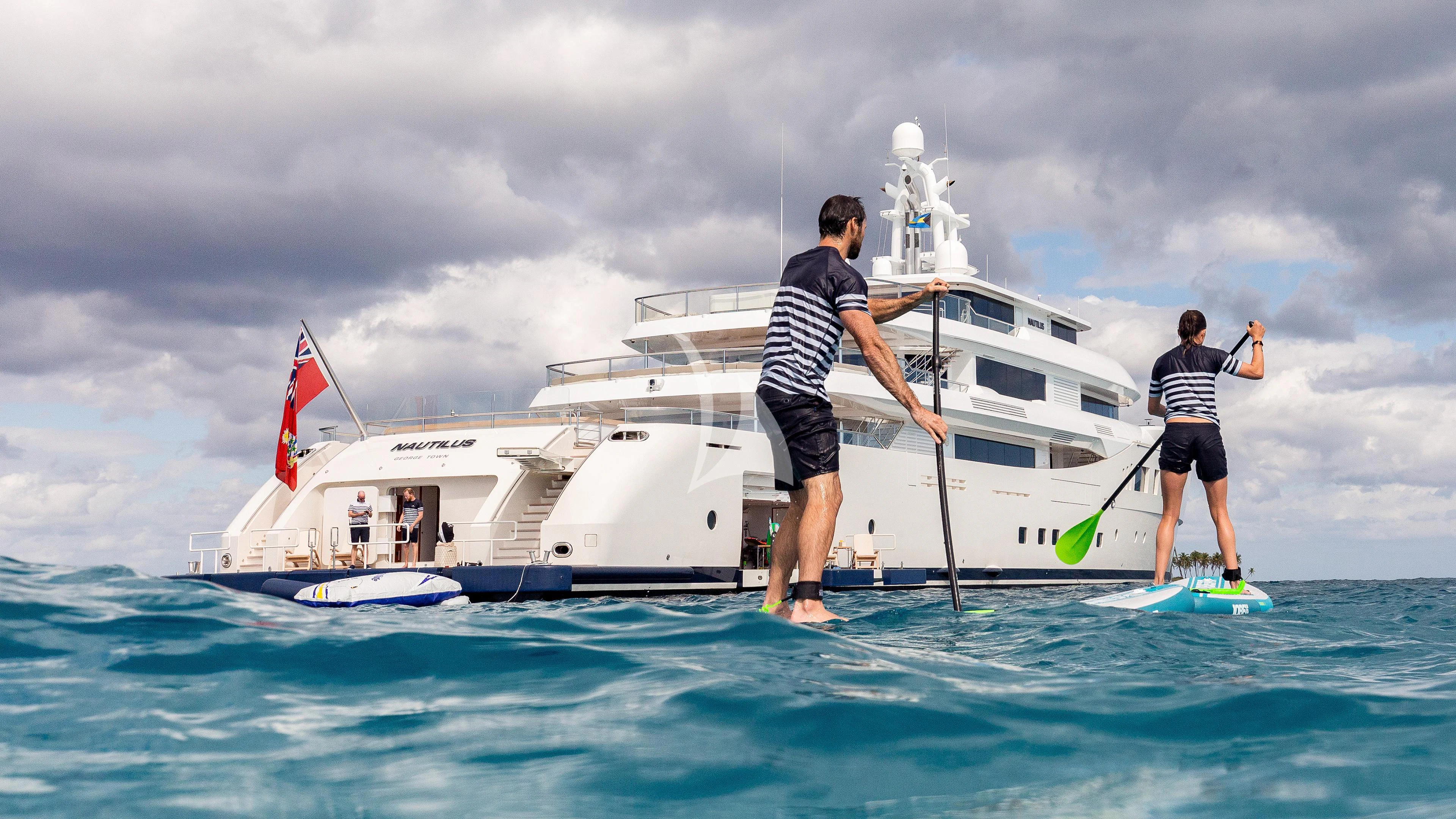 two men standing on a boat aboard NAUTILUS Yacht for Sale