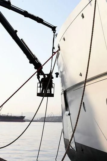 a boat with a large sail aboard NAUTILUS Yacht for Sale