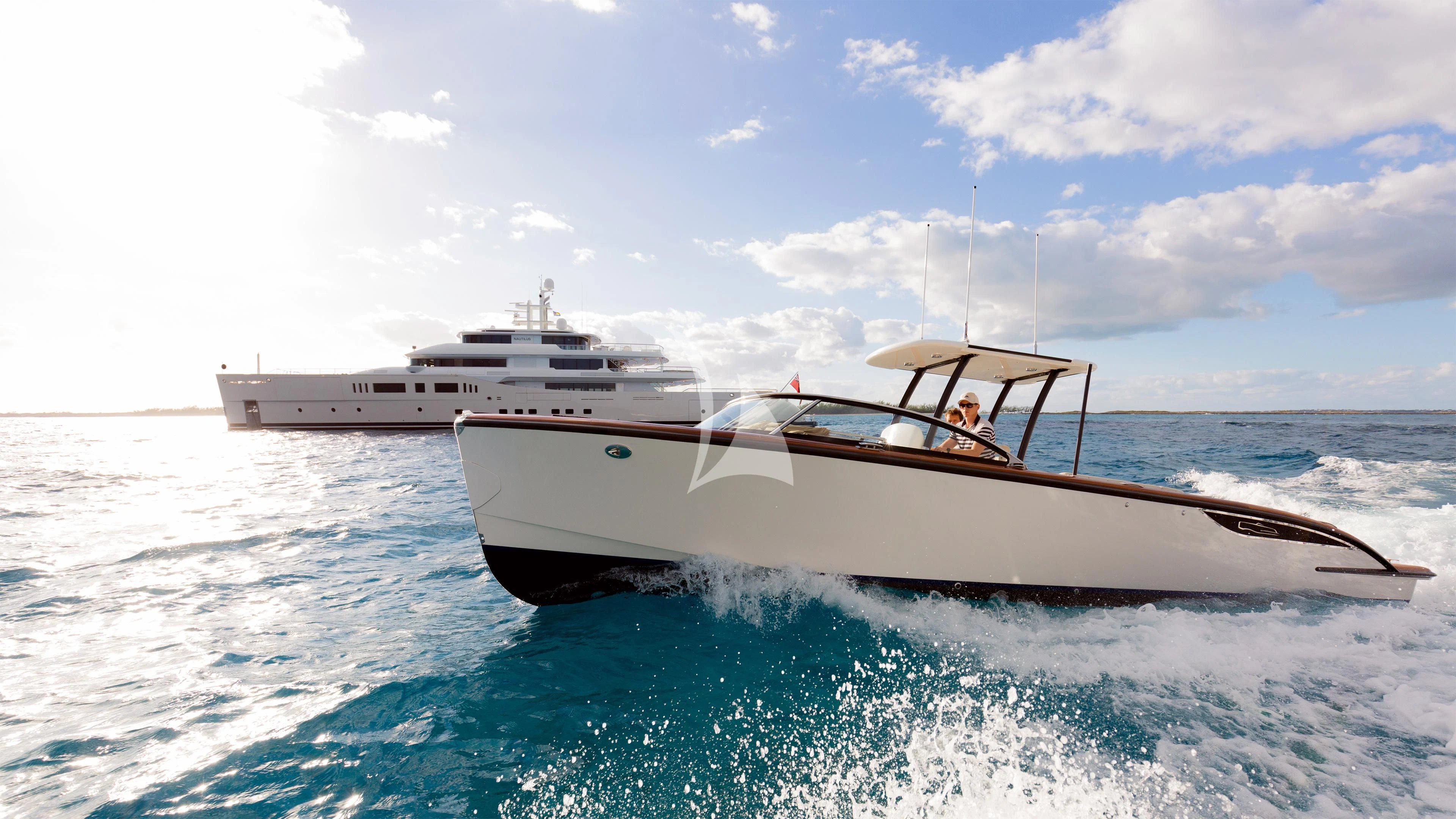 a couple of white boats in the water aboard NAUTILUS Yacht for Sale