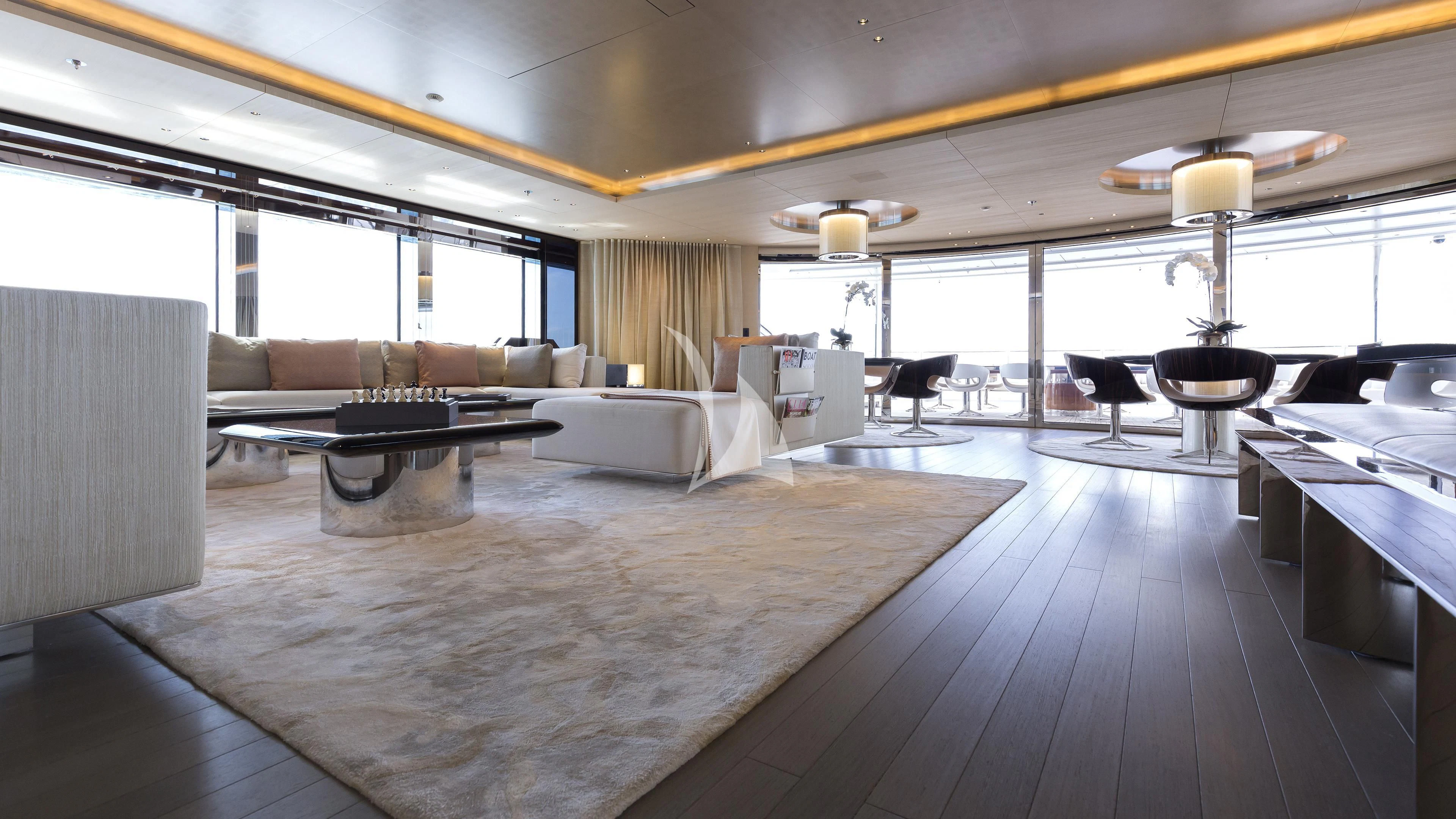 a large living room with a large glass window aboard NAUTILUS Yacht for Sale