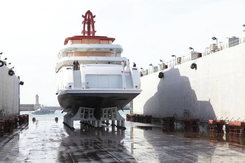 a white boat with red roof aboard NAUTILUS Yacht for Sale