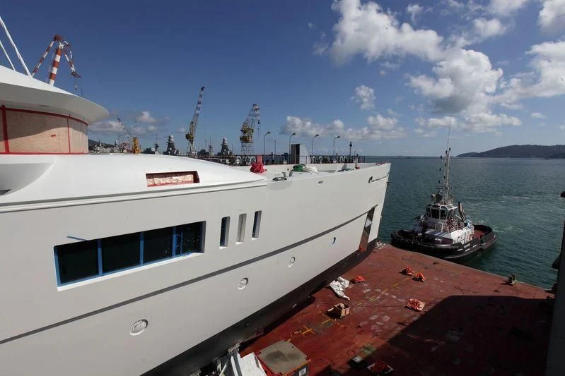 a boat docked at a pier aboard NAUTILUS Yacht for Sale