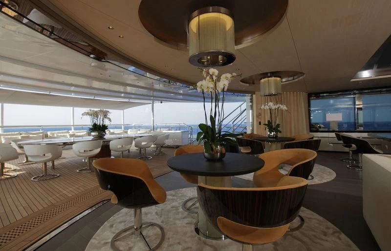 a room with a table and chairs aboard NAUTILUS Yacht for Sale