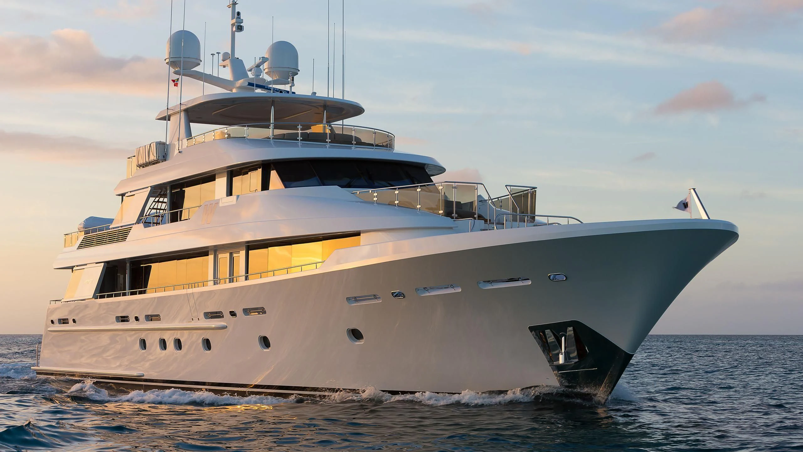 a large boat on the beach aboard WESTPORT 130 #4016 Yacht for Sale