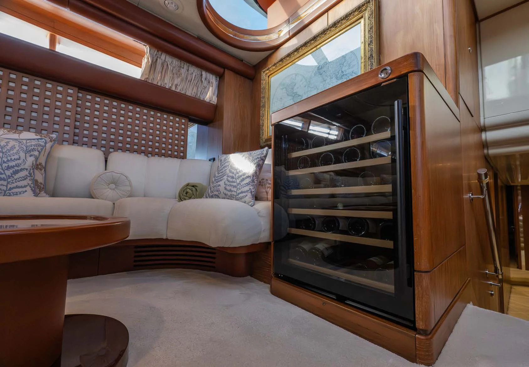a living room with a fireplace aboard LA CATTIVA 1 Yacht for Sale