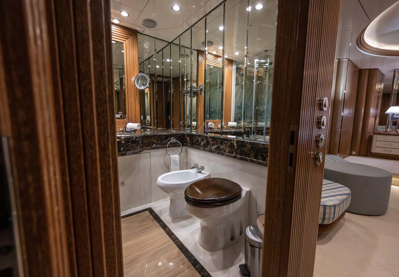 a bathroom with a large mirror aboard LA CATTIVA 1 Yacht for Sale
