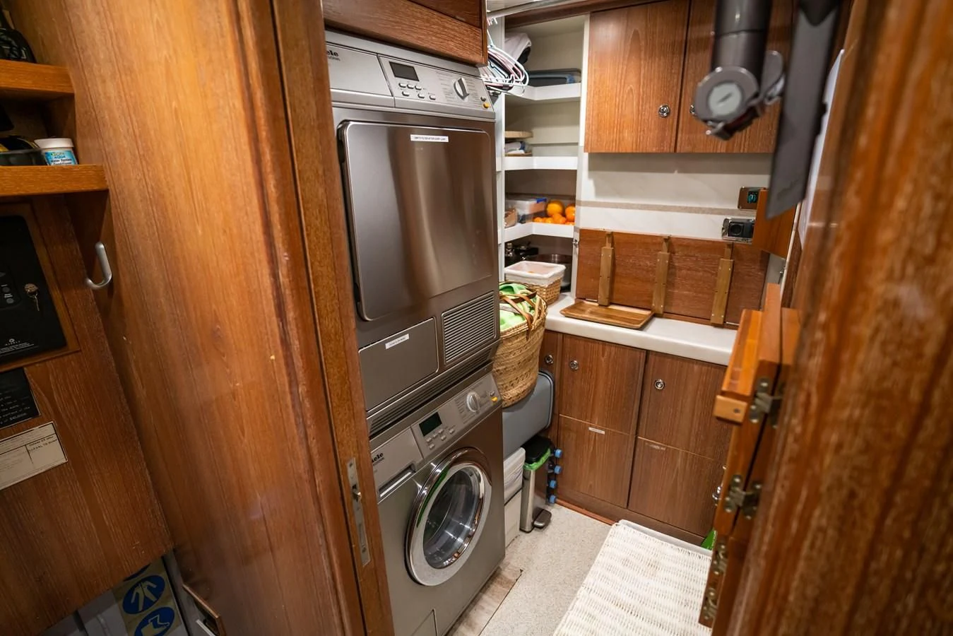 a kitchen with a washing machine aboard LA CATTIVA 1 Yacht for Sale