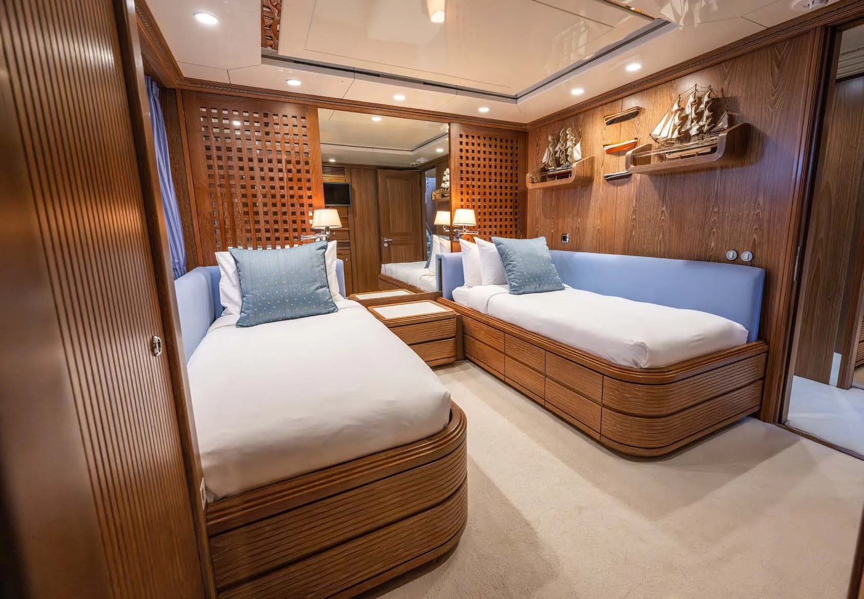 a room with a bed and a chair aboard LA CATTIVA 1 Yacht for Sale