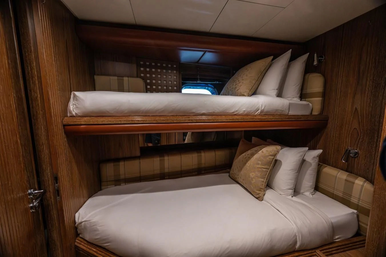 a bed with pillows aboard LA CATTIVA 1 Yacht for Sale